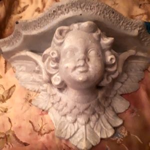 Retro cherub sconce